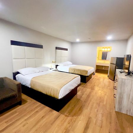 Economy Inn And Suites Талса Экстерьер фото